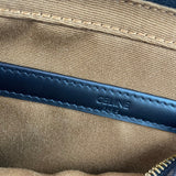 Close-up detail of structured classic women's handbag – women's luxury accessory