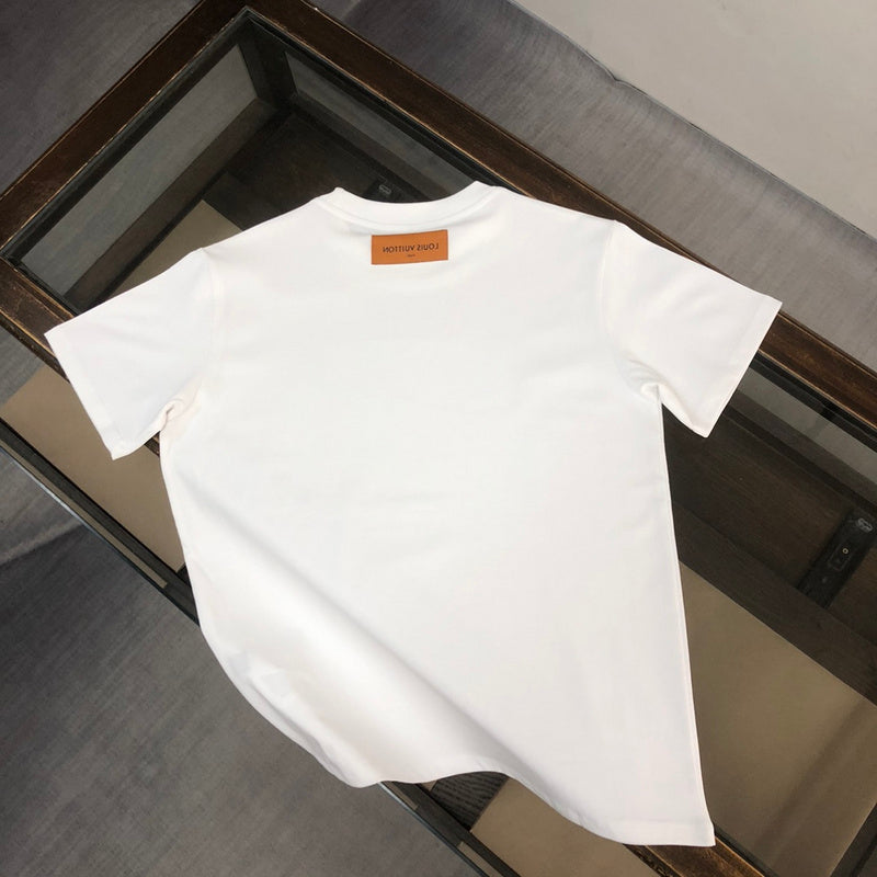 Close-up detail shot of Louis Vuitton cotton t-shirt with label-forward styling