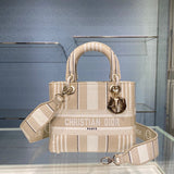 Side profile of signature chic women's handbag – women's designer-style accessory