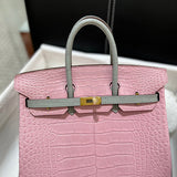 Side view of classic structured handbag