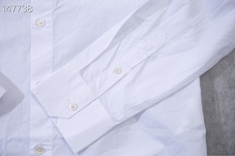 Full styled look of Louis Vuitton luxury clothing with monogram-inspired silhouette