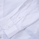 Full styled look of Louis Vuitton luxury clothing with monogram-inspired silhouette