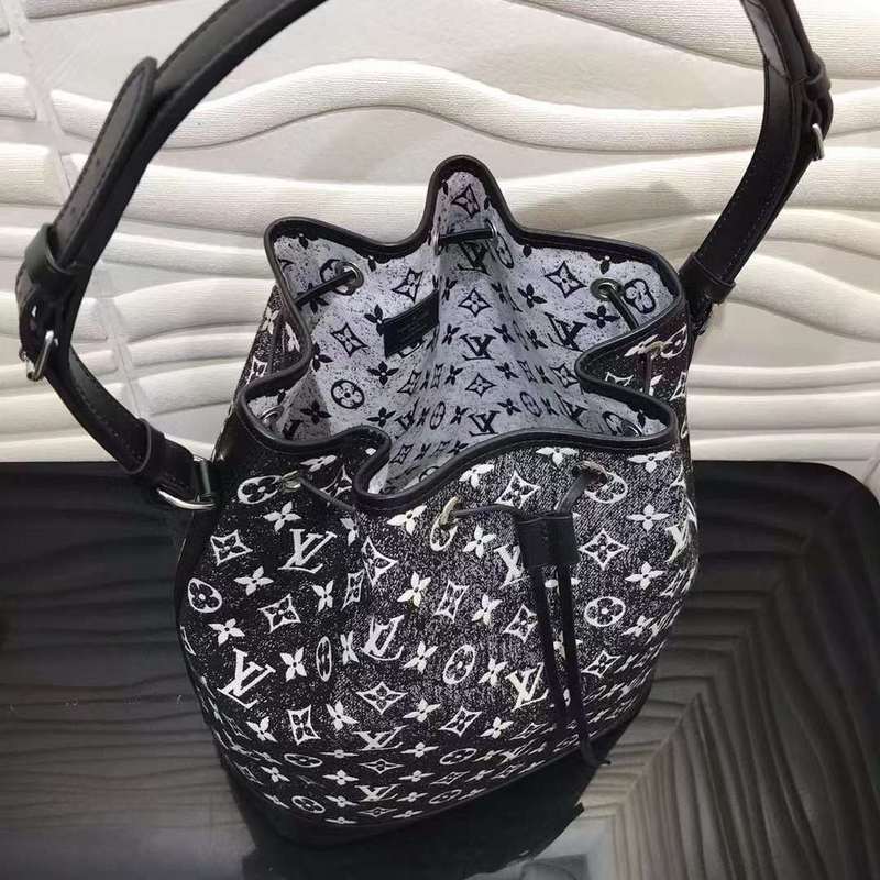Front view of elevated signature women's handbag – women's statement bag