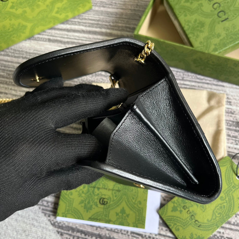 Side profile of modern polished women's handbag – women's designer-style accessory
