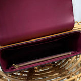 Side profile of chic polished women's handbag – women's luxury handbag
