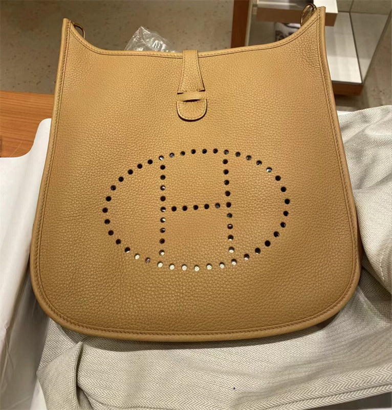  structured top-handle bag styled with outfit 18