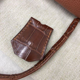 Side view of modern structured handbag