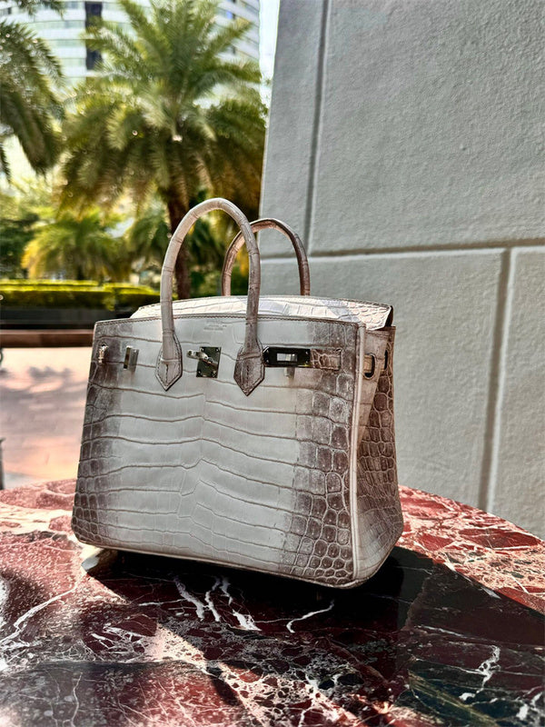  contemporary top-handle bag detail view showing craftsmanship