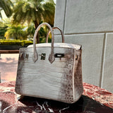  contemporary top-handle bag detail view showing craftsmanship