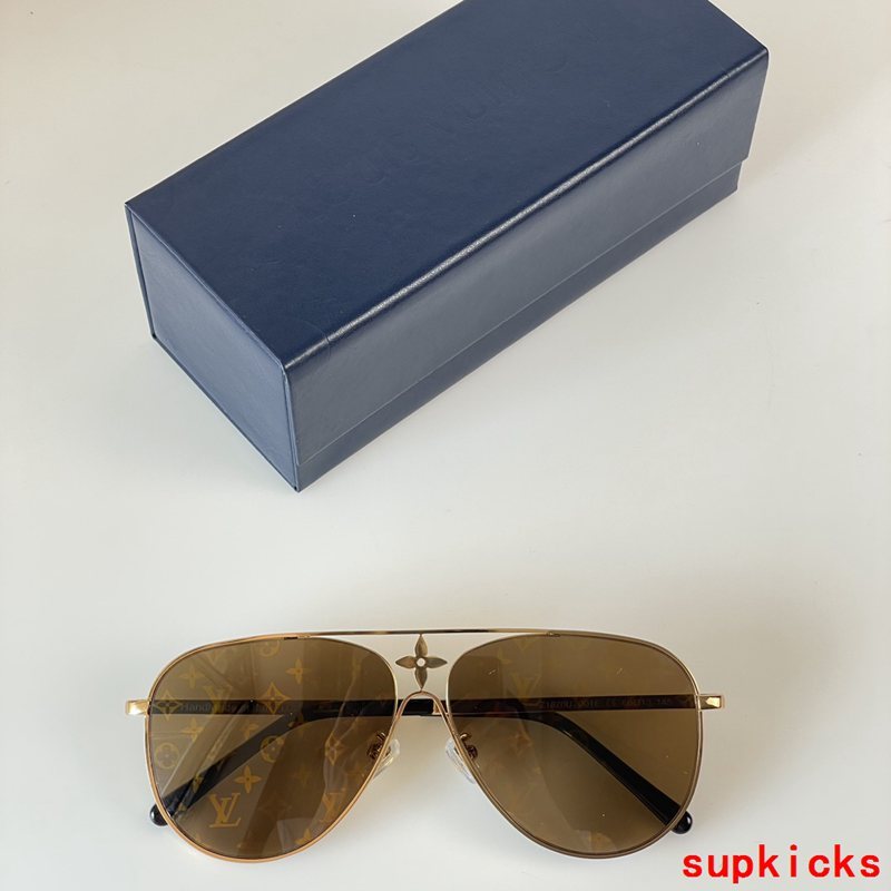 Close-up detail view of Louis Vuitton unisex sunglasses