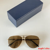 Close-up detail view of Louis Vuitton unisex sunglasses