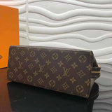 Styled lifestyle shot of signature structured women's handbag – women's designer-style accessory