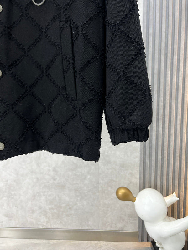 Texture and finish detail of Burberry luxury piece style No.415