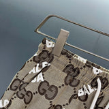 Full styled look of Gucci luxury clothing with monogram-inspired silhouette