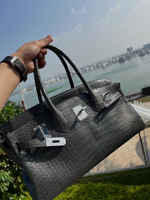 Polished bag shown from front angle