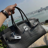 Polished bag shown from front angle