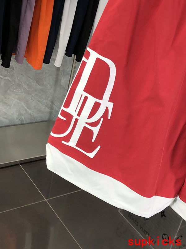 Front view of Rhude luxury clothing with label-forward styling