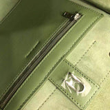Side profile of refined modern women's handbag – women's statement bag