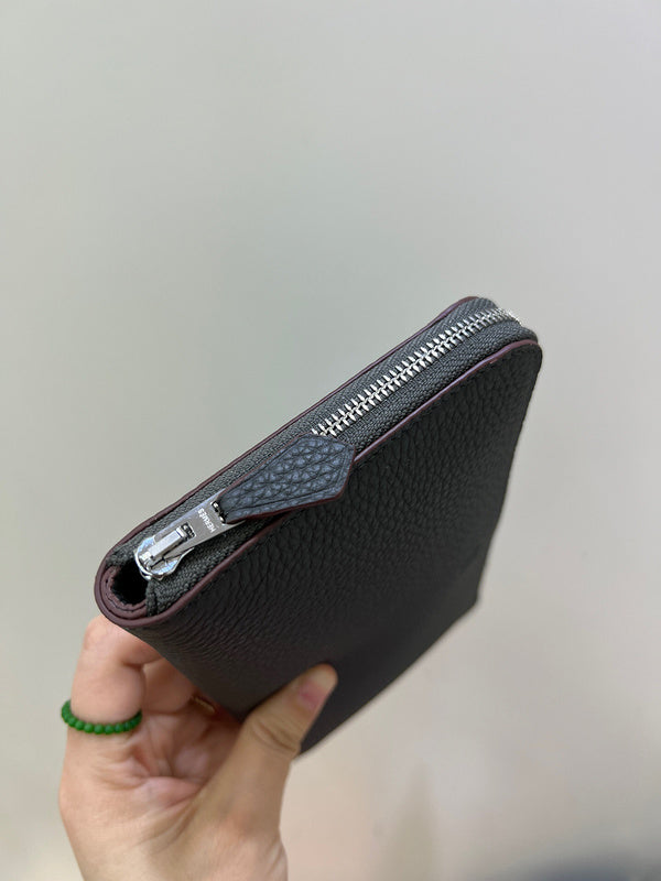 Side view of poised structured handbag