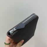Side view of poised structured handbag