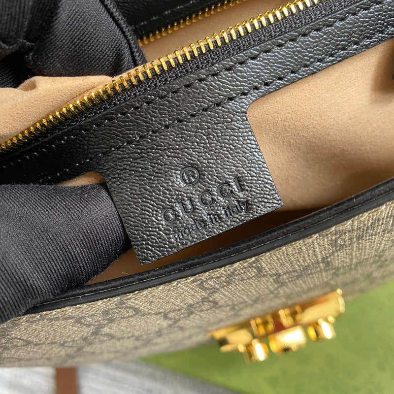 Side profile of statement signature women's handbag – women's luxury handbag