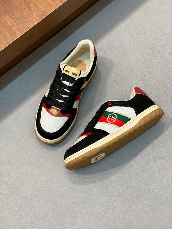 Side profile of Gucci fresh white-and-black sneakers sleek tonal finish
