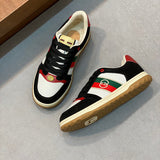 Side profile of Gucci fresh white-and-black sneakers sleek tonal finish