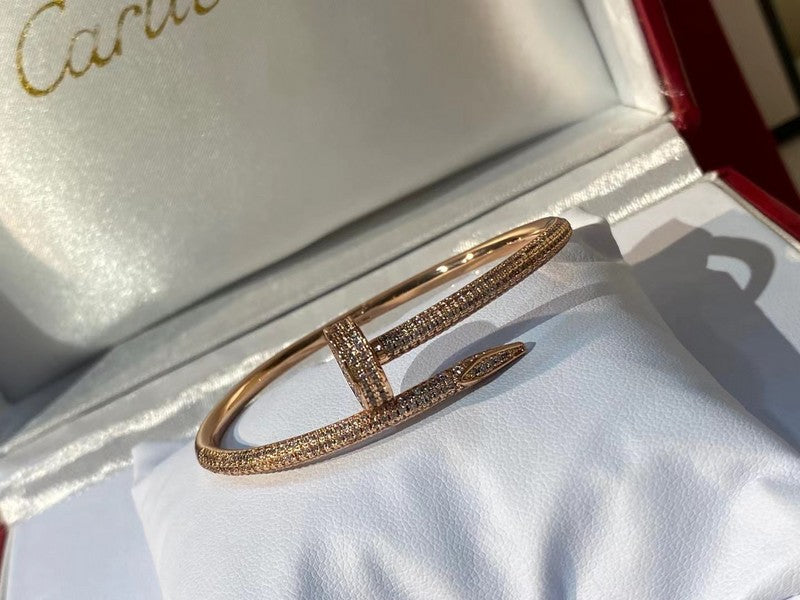 Front view of Cartier unisex jewelry piece