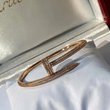 Front view of Cartier unisex jewelry piece