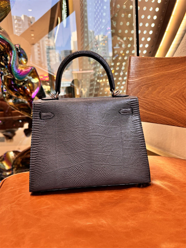 Side view of sleek structured handbag