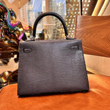 Side view of sleek structured handbag