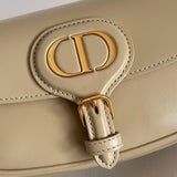 Side profile of premium sleek women's handbag – women's luxury accessory