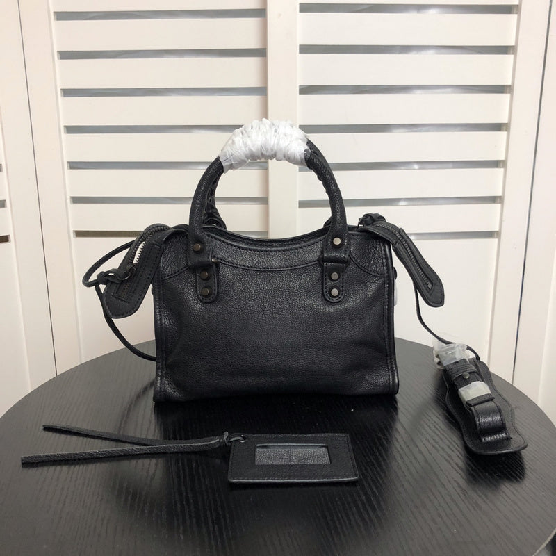 Front view of elevated classic women's handbag – women's designer-style accessory