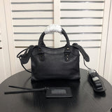 Front view of elevated classic women's handbag – women's designer-style accessory