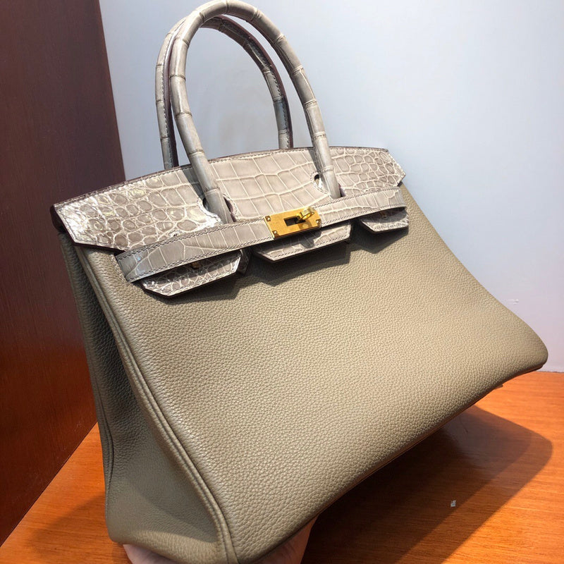 Side view of statement structured handbag