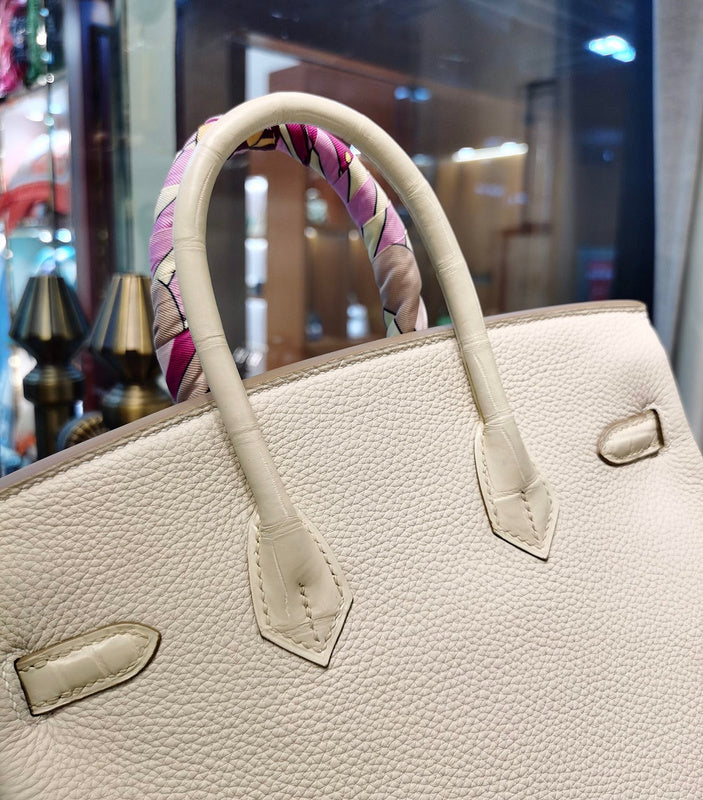 Side view of elegant structured handbag