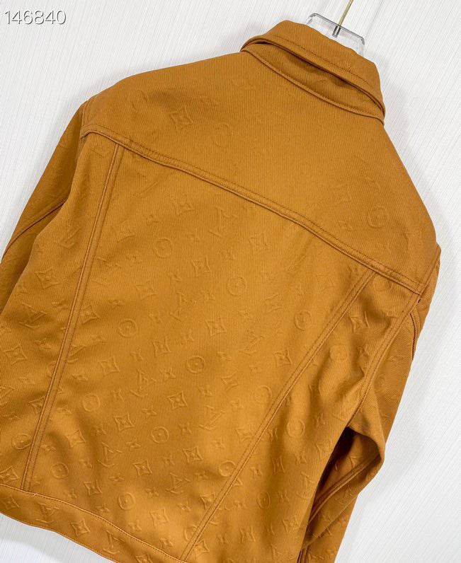 Front view of Louis Vuitton luxury clothing with tailored silhouette