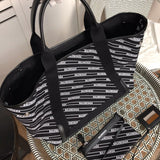Back view of refined signature women's handbag – women's premium purse
