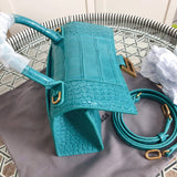 Top view of structured polished women's handbag – women's luxury accessory