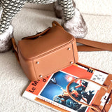  Contemporary shoulder bag carried on shoulder
