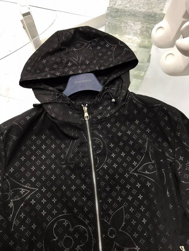 Flat lay presentation of Louis Vuitton luxury clothing with tailored silhouette