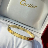 Front view of Cartier unisex jewelry piece