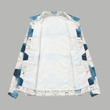 Close-up detail shot of Louis Vuitton luxury clothing with signature branding