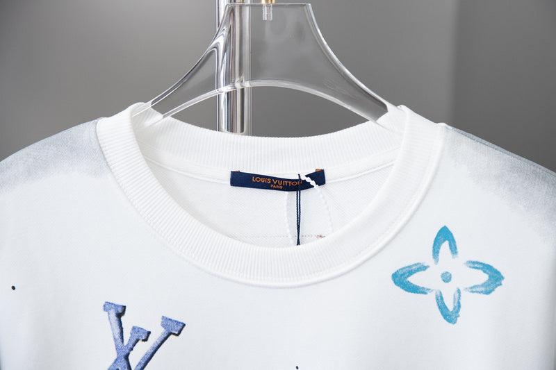 Close-up detail shot of Louis Vuitton luxury clothing with streetwear-inspired cut