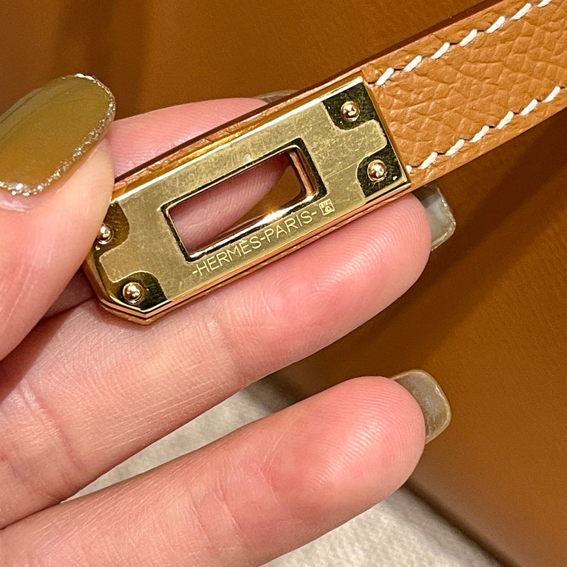 Side view of sculpted structured handbag
