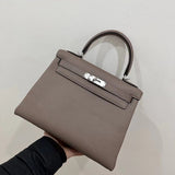 Side view of contemporary structured handbag