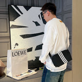 Close-up detail shot of Louis Vuitton luxury clothing with relaxed-fit cut