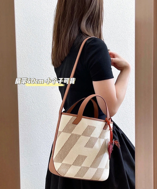Side view of tailored structured handbag