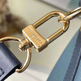 Handle and strap detail of modern sleek women's handbag – women's luxury accessory