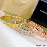 Side view of Van Cleef & Arpels unisex jewelry piece
